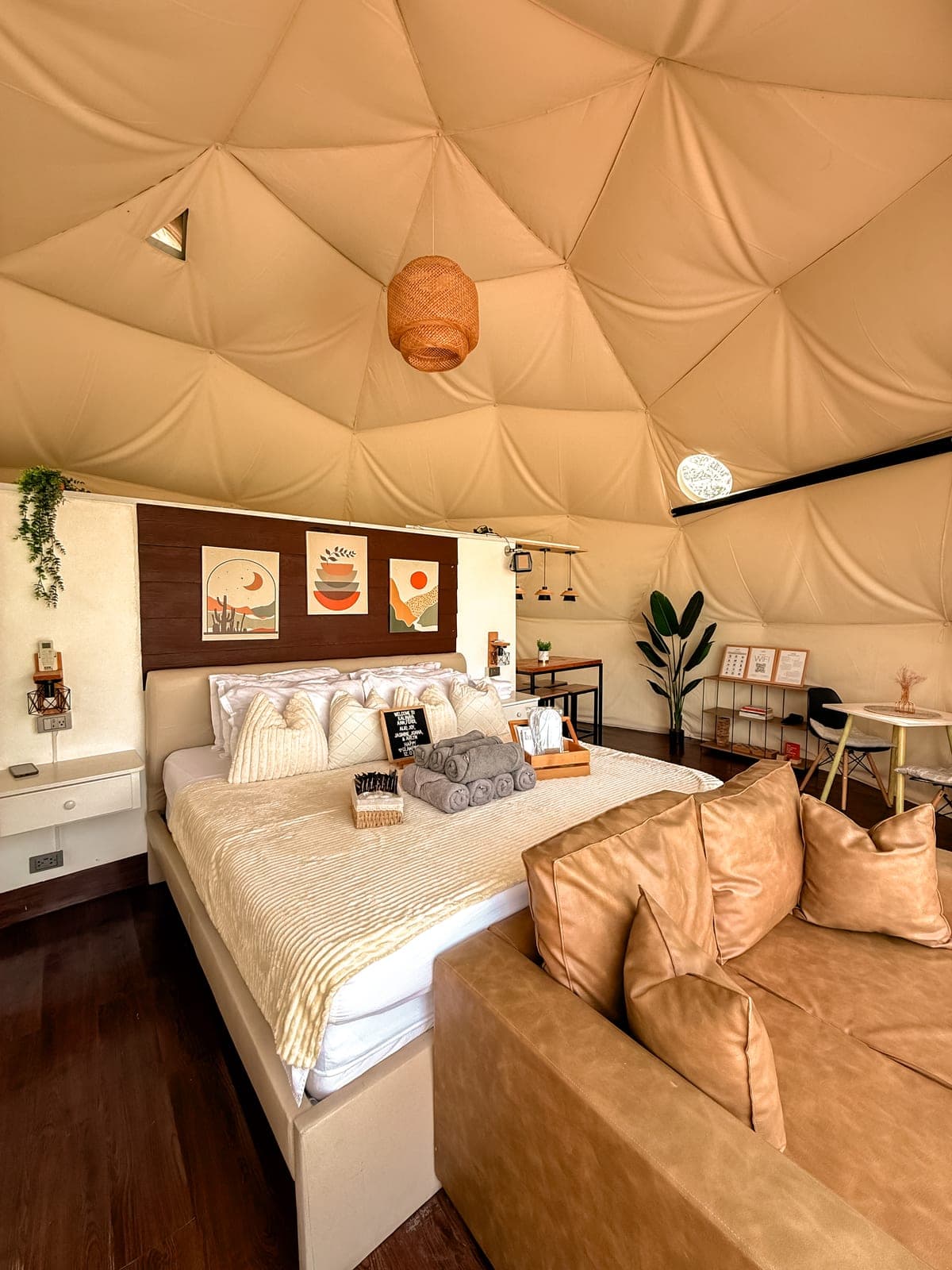 Dome 1: the leather couch beside the bed