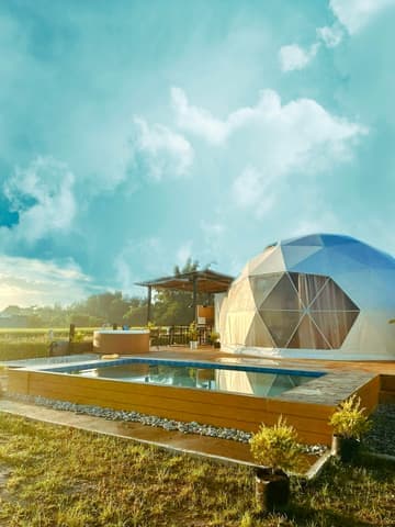 The dome, deck and pool in full sunlight